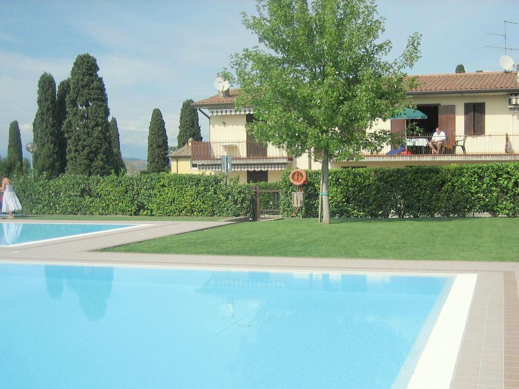 Belvilla By Oyo Enticing Holiday Home With Pool Lazise Bagian luar foto