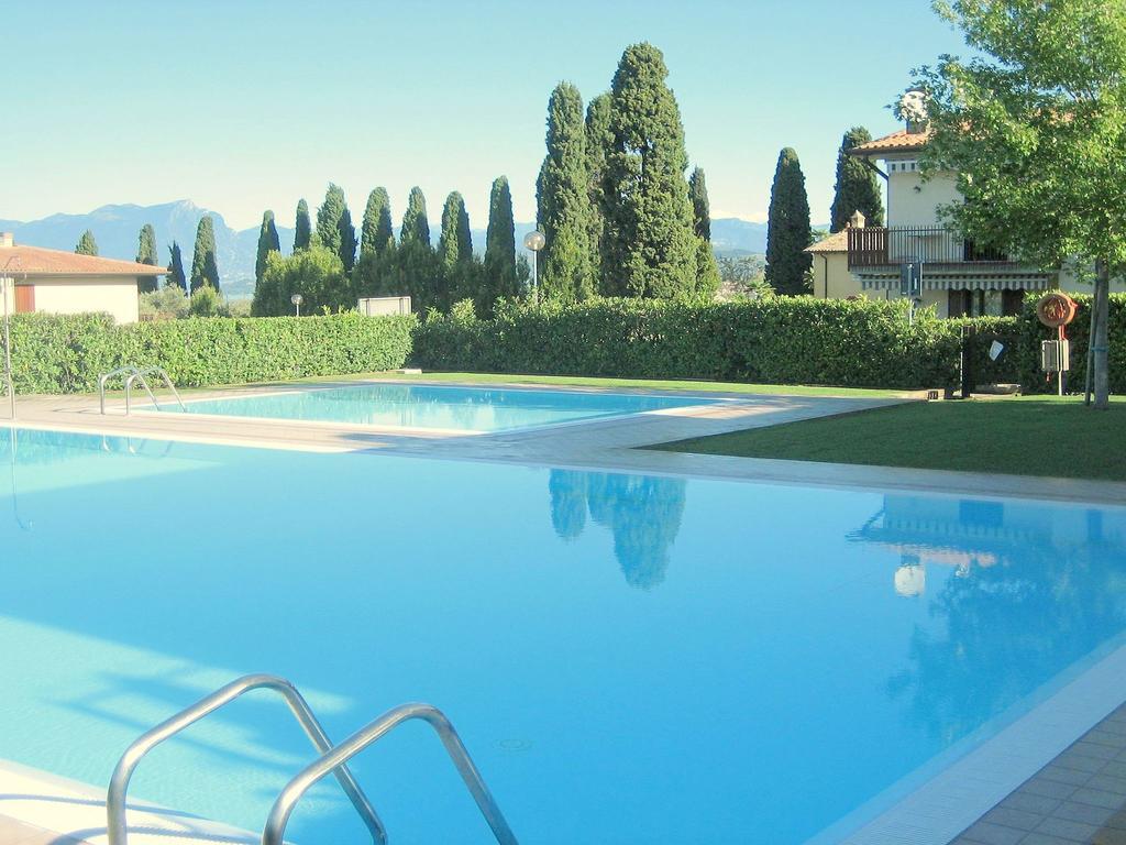 Belvilla By Oyo Enticing Holiday Home With Pool Lazise Bagian luar foto