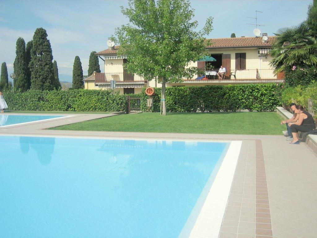 Belvilla By Oyo Enticing Holiday Home With Pool Lazise Bagian luar foto